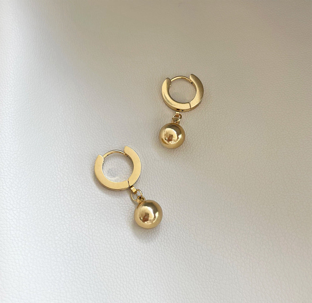 ELLIE GOLD BALL DROP HUGGIE EARRINGS