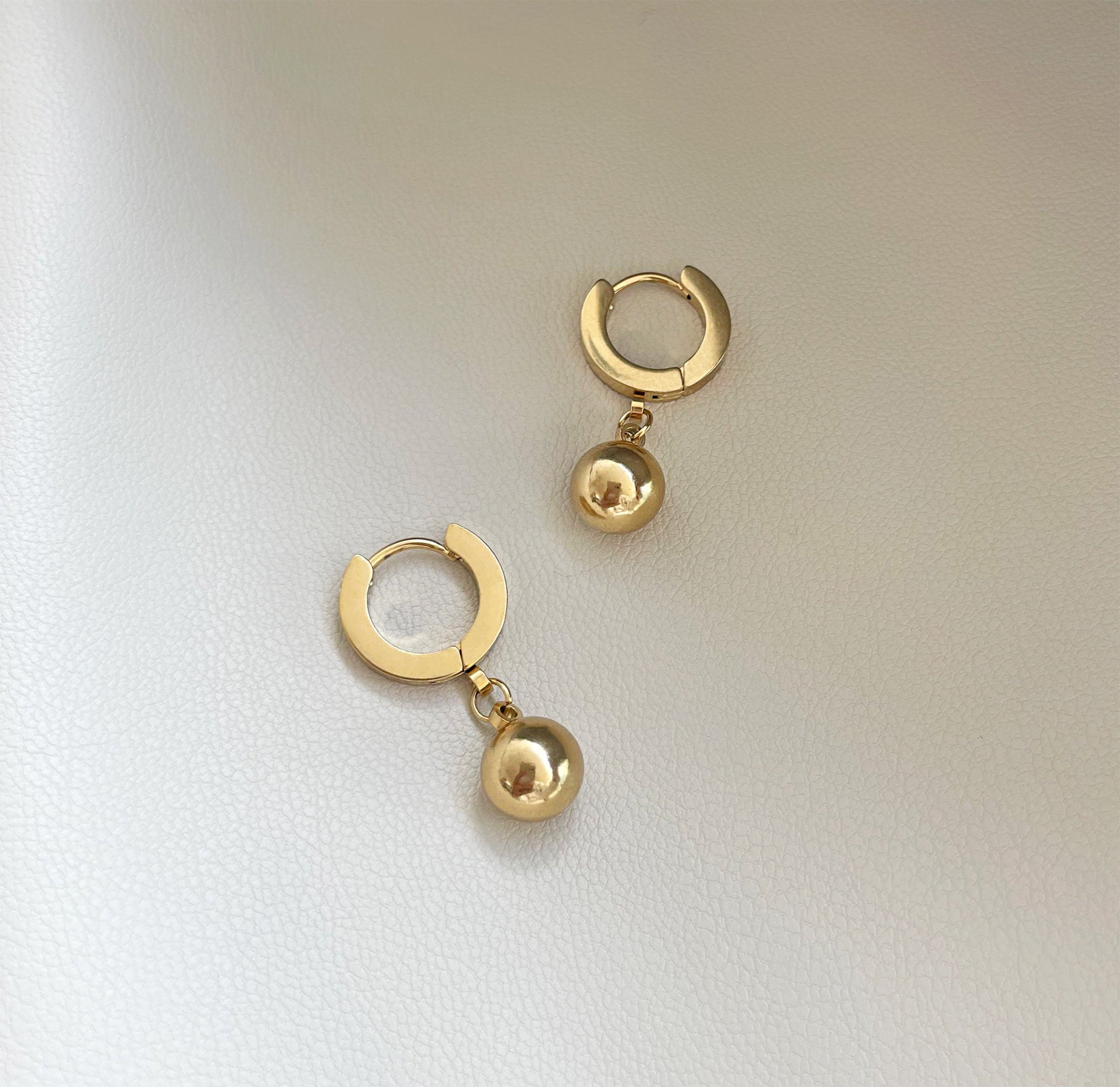 ELLIE GOLD BALL DROP HUGGIE EARRINGS