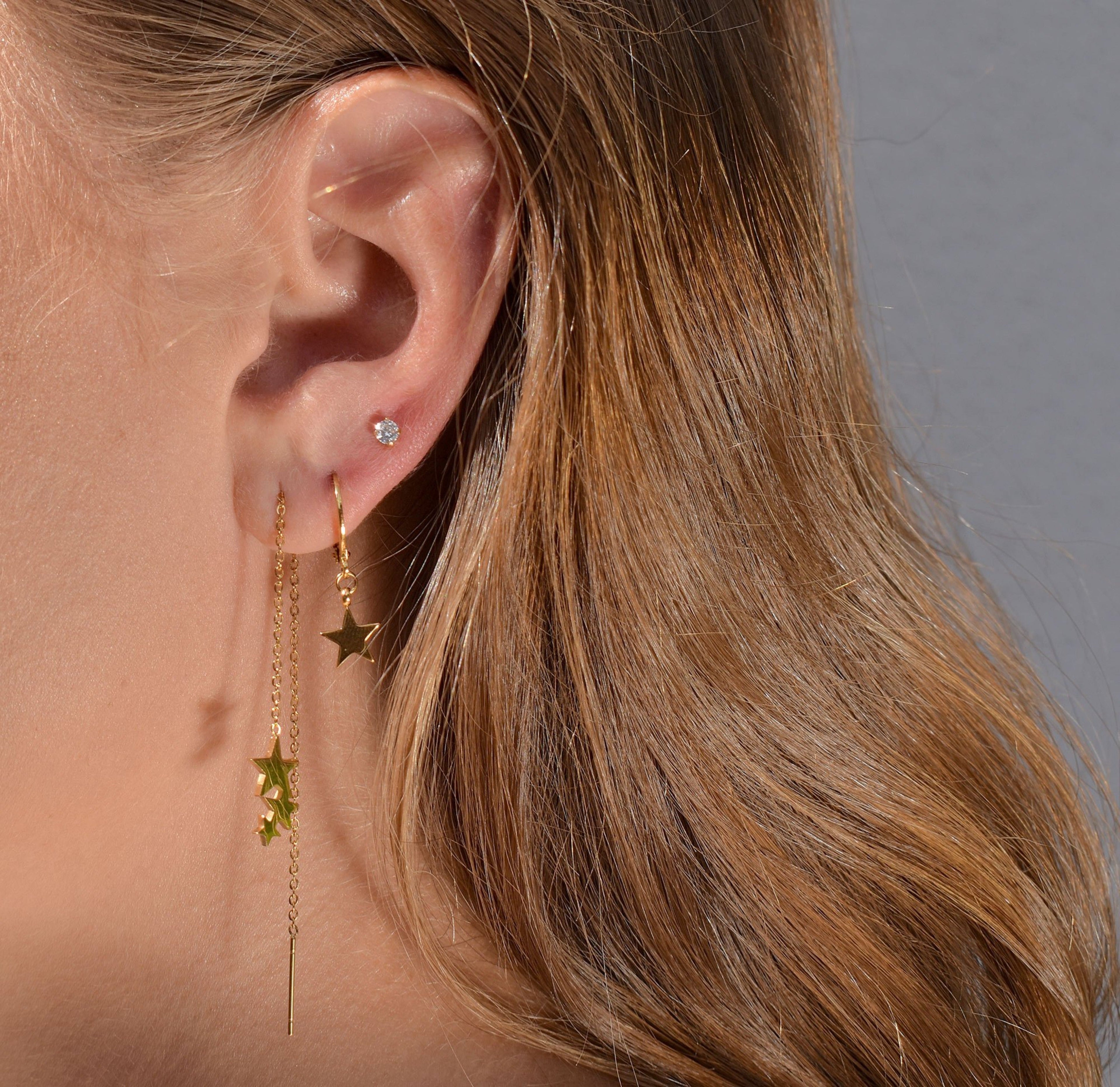 EMRY GOLD STAR HUGGIE EARRINGS