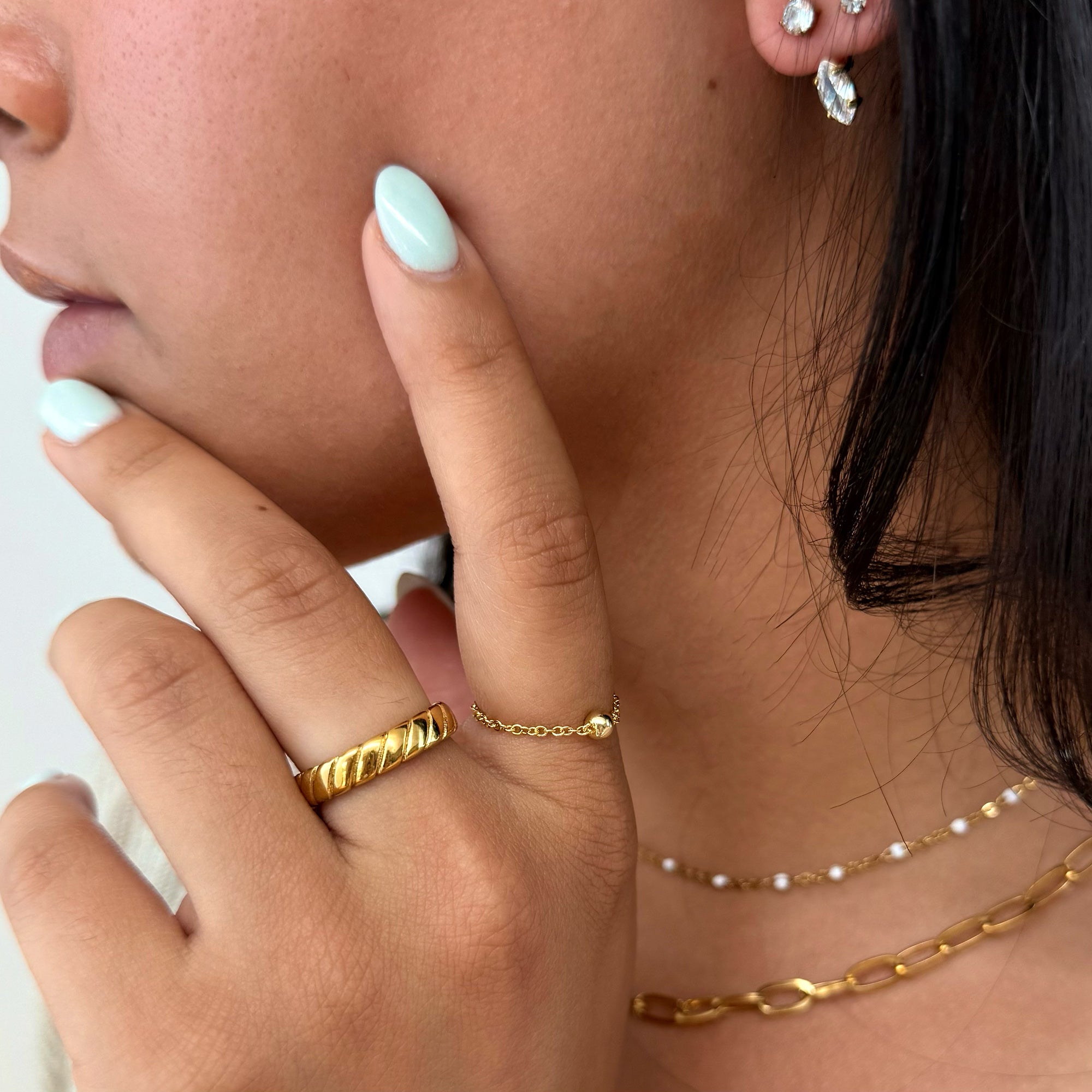 TEGAN GOLD TWIST FLAT RING BAND
